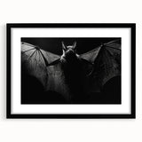 Black-framed wall art featuring a detailed bat design from the "Animals A Wild Life" collection, set against a white mat, ideal for nature-themed decor.