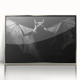 Framed wall art featuring a stylized bat design in silver acrylic, showcasing intricate details and a modern aesthetic, perfect for wildlife-themed decor.