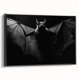 Framed wall art featuring a striking bat design, showcasing intricate details and a bold black frame, perfect for enhancing wildlife-themed decor.