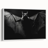 Framed wall art depicting a bat design from the "Animals A Wild Life" collection, showcasing intricate details and a white frame, perfect for nature-themed decor.