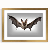 Elegant wall art showcasing a gold-framed bat design, featuring intricate details and a mat, ideal for wildlife decor in modern interiors.