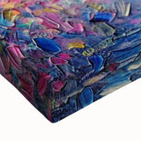 Close-up view of a stretched canvas featuring a vibrant bat design, showcasing intricate details and rich colors, perfect for wildlife-themed decor.