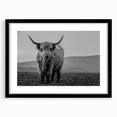 Framed wall art featuring a majestic buffalo design in a black frame, complete with a mat, showcasing the beauty of wildlife. Ideal for nature lovers and home decor enthusiasts.