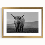 Framed wall art showcasing a majestic buffalo design in golden hues, perfect for enhancing wildlife-themed decor. Ideal for nature lovers and art enthusiasts.