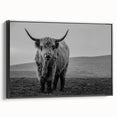 Framed wall art featuring a striking black buffalo design, showcasing intricate details and textures on a canvas, ideal for wildlife decor enthusiasts.