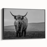 Framed wall art featuring a striking black buffalo design, showcasing intricate details and textures on a canvas, ideal for wildlife decor enthusiasts.