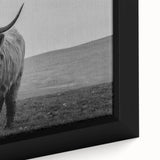 Close-up of a framed canvas wall art featuring a detailed illustration of a buffalo, showcasing its majestic features and textures, perfect for wildlife decor.