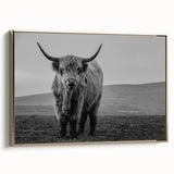 Framed canvas wall art featuring a majestic side view of a bison against a serene backdrop, enhanced with a gold frame, ideal for wildlife decor enthusiasts.