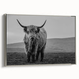 Framed wall art featuring a majestic buffalo in profile, showcasing intricate details and a silver frame, perfect for adding a touch of wildlife elegance to any decor.