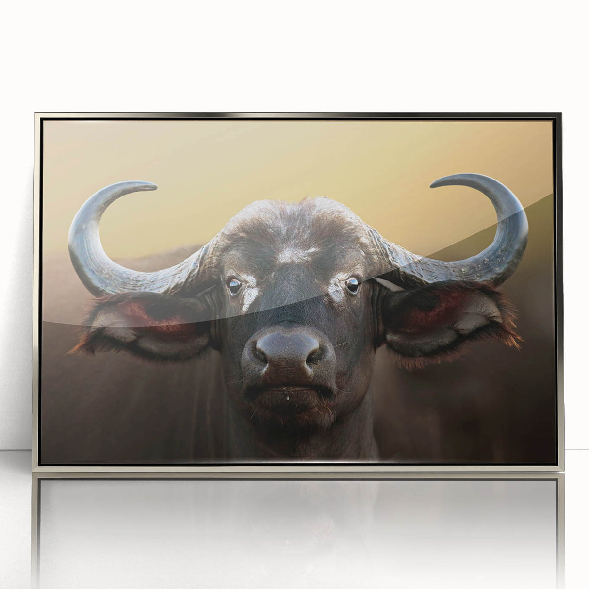 Framed wall art featuring a detailed silver-accented design of a buffalo, showcasing vibrant colors and textures, perfect for wildlife enthusiasts and home decor.
