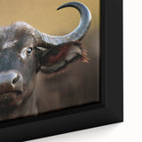 Close-up view of a framed canvas wall art featuring a majestic buffalo, showcasing intricate details and vibrant colors, ideal for wildlife enthusiasts and home decor.