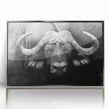 Framed wall art showcasing a striking silver-accented buffalo design, perfect for wildlife enthusiasts, adding sophistication to any decor.