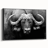 Framed canvas wall art featuring a striking side view of a buffalo, showcasing intricate details and textures in black and white. Ideal for wildlife enthusiasts and home decor.