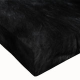 Close-up view of a stretched canvas wall art featuring a detailed design of a wild buffalo, showcasing vibrant colors and textures, perfect for animal-themed decor.