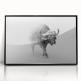 Framed wall art featuring a striking black bison design, showcasing the animal's majestic profile against a vibrant background. Ideal for wildlife enthusiasts and modern decor.