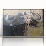 Framed wall art featuring a detailed silver-accented buffalo design, showcasing a majestic bison in a natural setting, perfect for wildlife enthusiasts and home decor.