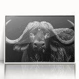 Framed wall art showcasing a striking design of a buffalo in a natural setting, featuring vivid colors and intricate details, ideal for wildlife enthusiasts and home decor.