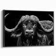 Framed canvas wall art showcasing a black buffalo design in profile, ideal for wildlife enthusiasts and modern decor lovers, adding a striking touch to any interior.