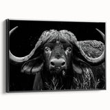 Framed canvas wall art showcasing a black buffalo design in profile, ideal for wildlife enthusiasts and modern decor lovers, adding a striking touch to any interior.