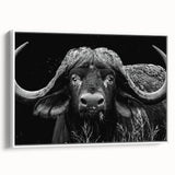 Framed wall art featuring a side view of a majestic buffalo in a natural landscape, highlighting its detailed features and textures, perfect for wildlife enthusiasts.