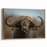 Framed canvas wall art depicting a majestic buffalo in a natural setting, featuring rich colors and intricate details, ideal for wildlife enthusiasts and home decor.