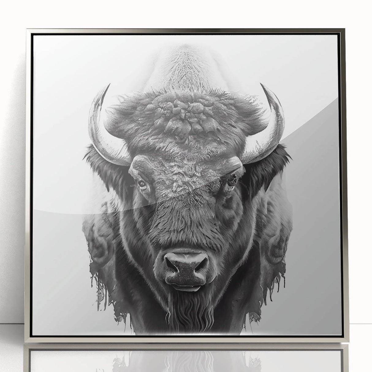 Framed wall art depicting a majestic buffalo in a natural setting, featuring a sleek silver frame that enhances the wildlife design, ideal for modern decor.