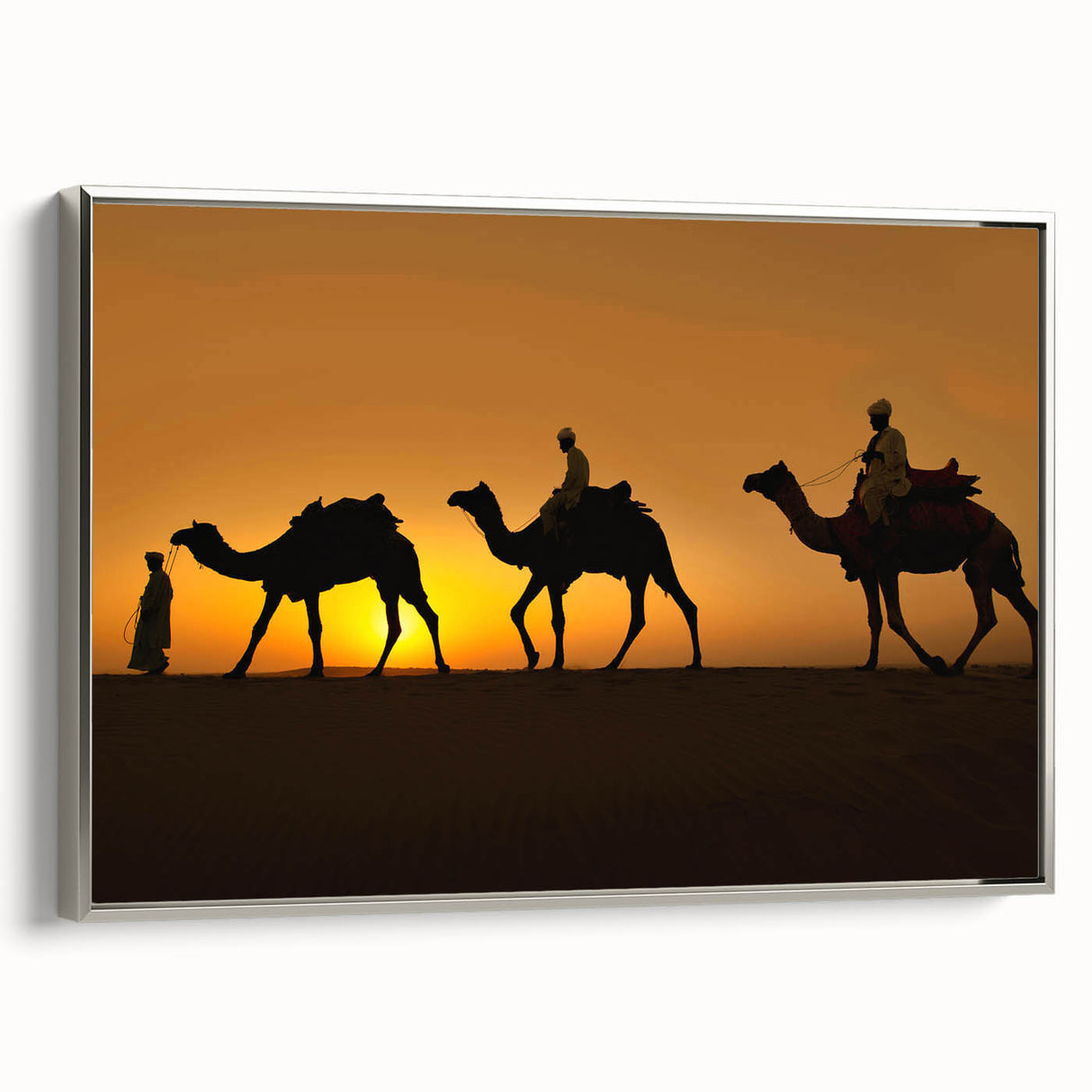 Framed wall art featuring a silver side view of a camel, showcasing intricate details and textures, perfect for adding a touch of elegance to any space.