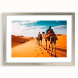 Framed wall art featuring a detailed camel design in a silver frame with a mat, perfect for adding a touch of wildlife elegance to home decor.