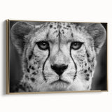 Framed canvas wall art featuring a striking cheetah design, showcasing intricate details in gold tones, perfect for animal lovers and modern decor enthusiasts.