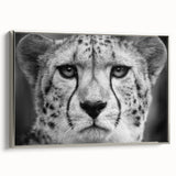 Framed wall art showcasing a sleek, silver-side view of a cheetah design, perfect for adding a touch of wildlife elegance to modern decor.