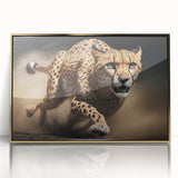 Framed wall art featuring a striking front view of a cheetah in a vibrant gold-acrylic finish, perfect for adding a touch of wildlife elegance to any space.