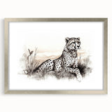 Framed wall art featuring a striking cheetah design in a silver frame with a white mat, showcasing the beauty of wildlife in contemporary decor.