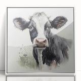 Framed acrylic wall art showcasing a stylized cow design in a modern white frame, perfect for adding a touch of nature-inspired decor to any space.