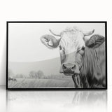 Framed wall art featuring a striking black acrylic design of a cow, showcasing intricate details and a modern aesthetic, ideal for animal lovers and home decor enthusiasts.