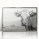 Framed acrylic wall art featuring a striking cow design in silver, perfect for adding a modern touch to home decor. Ideal for animal lovers and unique interior styling.