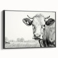Framed wall art featuring a black and white cow design from the "Animals of the Wild" collection, showcasing intricate details and textures, perfect for home decor.