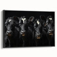 Framed canvas wall art featuring a black and white cow design, capturing intricate details and textures, perfect for animal lovers and rustic decor enthusiasts.