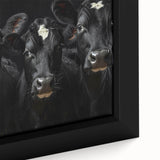 Close-up of a framed canvas wall art featuring a striking cow design, showcasing intricate details and vibrant colors, perfect for animal lovers and home decor enthusiasts.