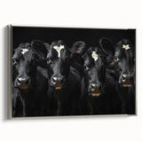 Framed wall art featuring a striking cow design in a contemporary style, showcased with a sleek silver frame, ideal for modern home decor and animal lovers.