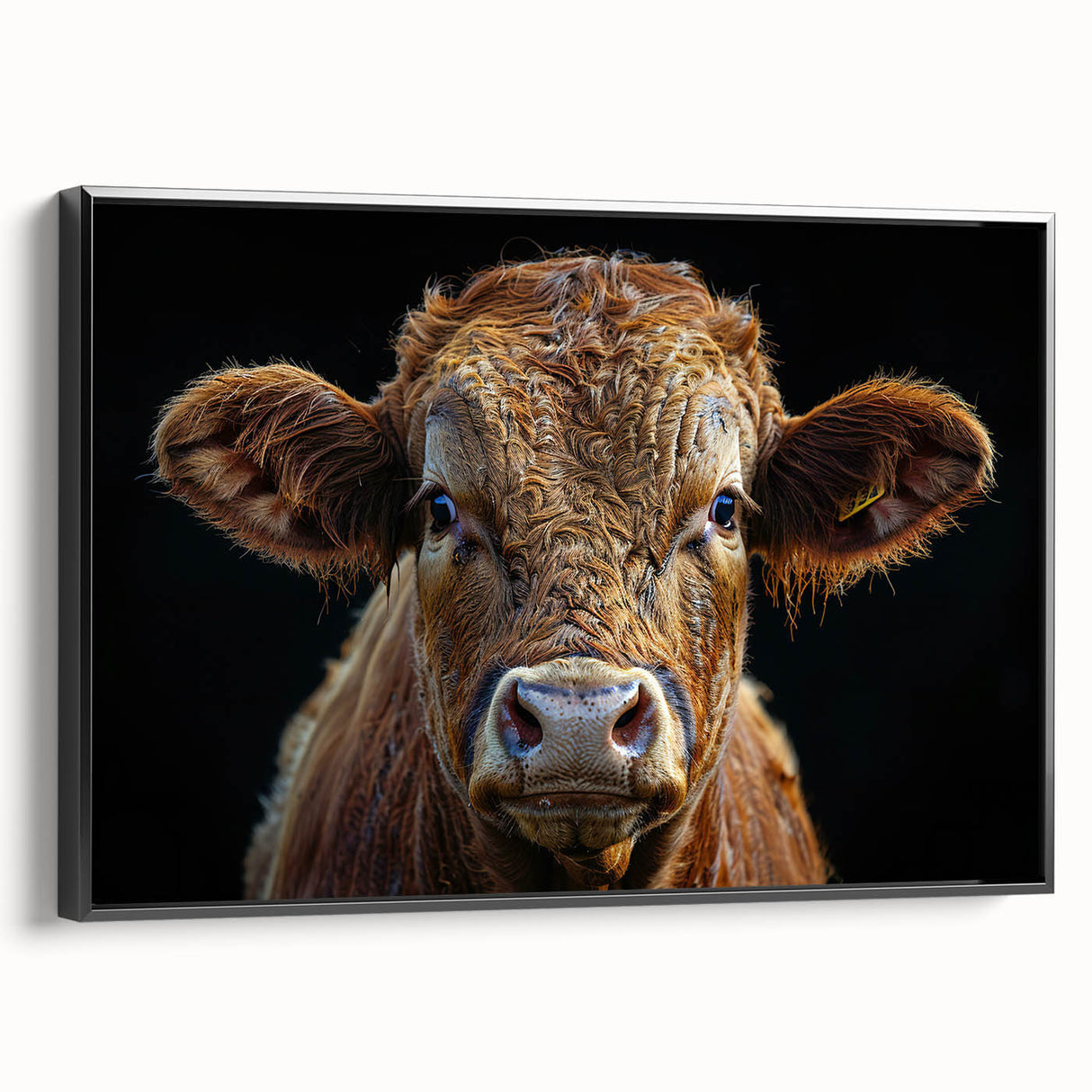 Framed canvas wall art showcasing a striking black and white cow design, perfect for animal lovers and rustic decor enthusiasts. The piece adds a contemporary touch to any room, enhancing aesthetic appeal with its bold contrast and intricate details.