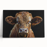 Colorful stretched canvas wall art featuring a whimsical cow design, leaning against a wall, perfect for adding a playful touch to home decor. Ideal for animal lovers.