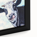 Close-up of a framed canvas showcasing a detailed cow design from the "Animals A Wild Life" collection, featuring vibrant colors and intricate textures perfect for nature-themed decor.
