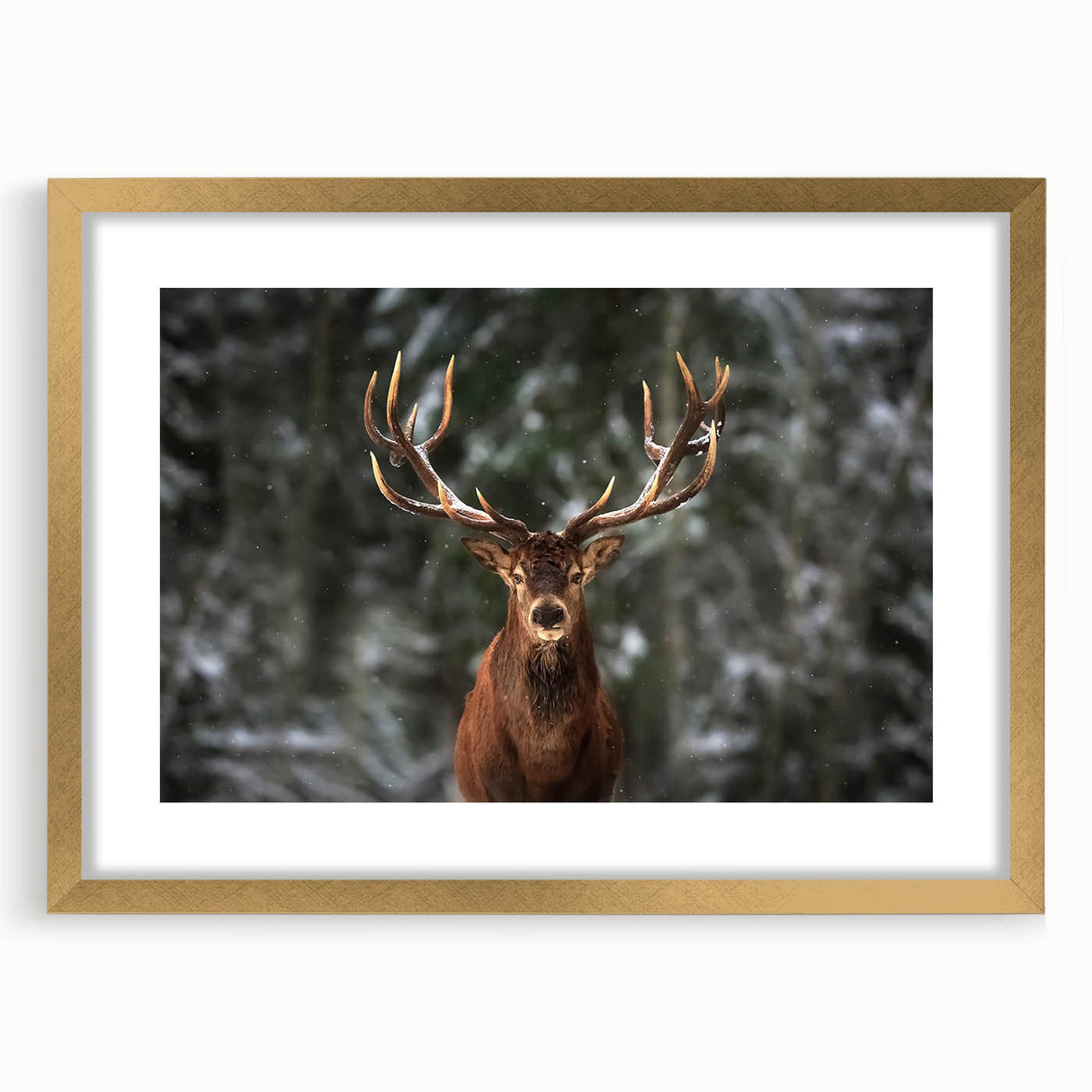 Elegant wall art featuring a framed deer design in gold, showcasing intricate wildlife details and a sophisticated mat, perfect for enhancing home decor and nature-themed interiors.