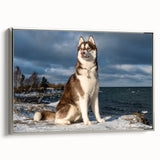 Framed canvas wall art featuring a vibrant design of various wild dogs in a natural setting, showcasing intricate details and a sleek silver frame, ideal for home decor.