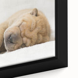 Close-up of a framed canvas wall art piece depicting a vibrant, colorful design featuring playful dogs in a wild-life theme, perfect for animal lovers and home decor.