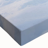 Close-up of a vibrant stretched canvas print showcasing a collection of wild dog designs, featuring intricate details and vivid colors, perfect for animal lovers and home decor enthusiasts.