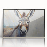 Framed wall art showcasing a vibrant donkey design, featuring a sleek silver acrylic frame. This contemporary piece adds a playful touch to home decor, perfect for animal lovers.