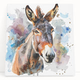 Stretched canvas wall art showcasing a whimsical donkey design in vibrant colors, ideal for animal lovers and home decor enthusiasts, leaning against a wall.