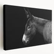 Side view of a stretched canvas featuring a whimsical donkey design, showcasing vibrant colors and playful details, perfect for animal-themed home décor.