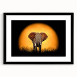 Elephant-themed wall art print showcasing a striking black and white design, framed with a matte finish, perfect for adding an artistic touch to home decor.